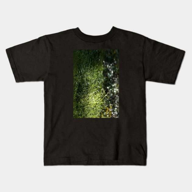 Glowing Green Grass After Rain Drops Fallen Kids T-Shirt by textural